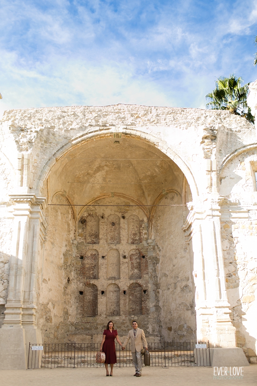 wedgewood-vintage-engagement-session-with-suitcases-mission-san-juan-capistrano-001